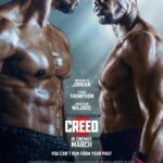 A close-up poster of Michael B Jordan and Jonathan Majors' respective characters in full boxing attire, squaring off against one another.