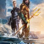 Aquaman stands defiantly, trident in hand, with his half-brother Orm behind him.