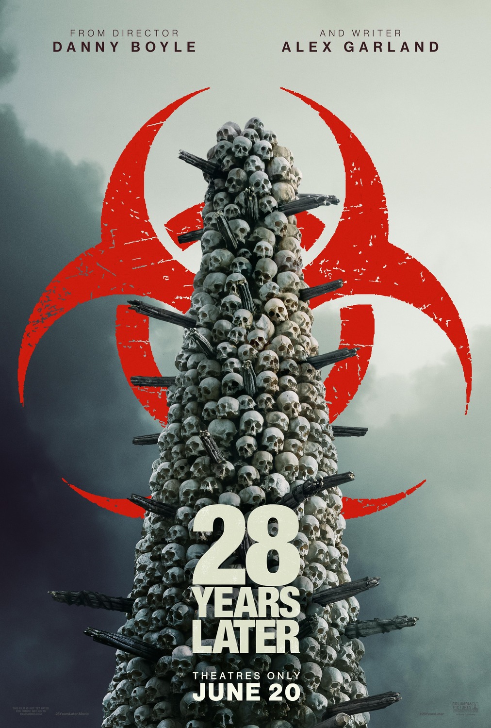 A huge tower of polished human skulls with a biohazard logo behind it.